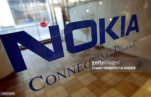 Picture taken in June 2004 shows the Nokia logo on the door of the empty premises in Helsinki. European stock markets skidded lower 15 July 2004...