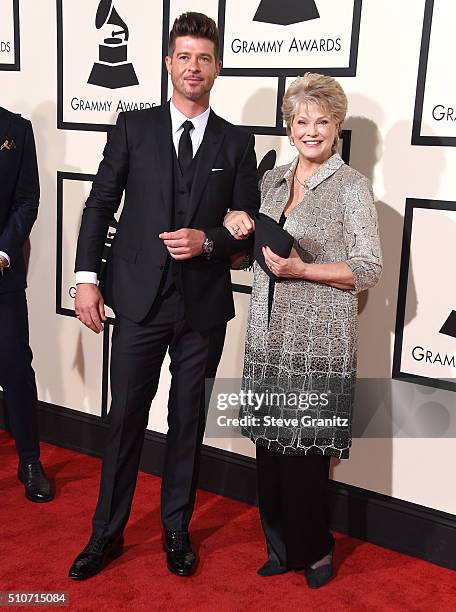 Robin Thicke and Gloria Loring arrives at the The 58th GRAMMY Awards at Staples Center on February 15, 2016 in Los Angeles City.