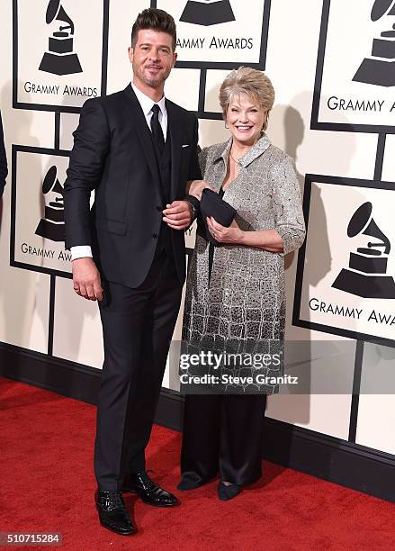 Robin Thicke and Gloria Loring arrives at the The 58th GRAMMY Awards at Staples Center on February 15, 2016 in Los Angeles City.