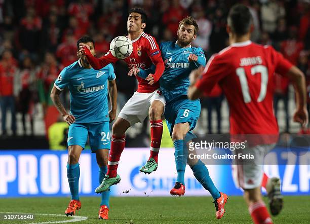 Benfica's forward from Mexico Raul Jimenez with FC Zenit's defender from Belgium Nicolas Lombaerts in action during the UEFA Champions League Round...