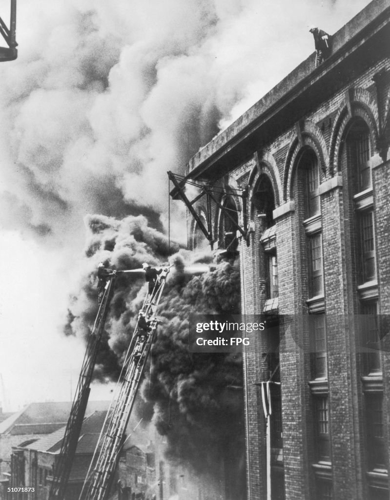 Colonial Firefighting Firemen battle to extinguish a warehouse fire on Colonial Wharf ...