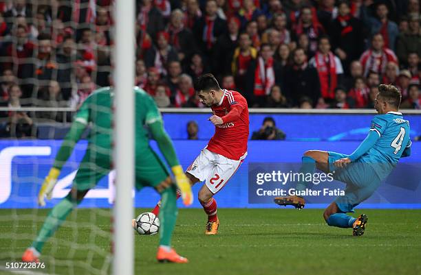 BenficaÕs midfielder Pizzi with FC ZenitÕs defender from Italy Domenico Criscito in action during the UEFA Champions League Round of 16: First Leg...