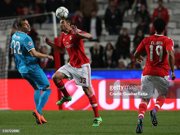 BenficaÕs defender from Brazil Jardel with FC ZenitÕs forward Artem Dzyuba in action during the UEFA Champions League Round of 16: First Leg match...