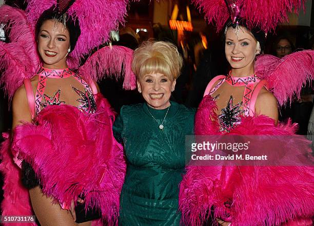 Dame Barbara Windor poses with dancers at the press night after party for "Mrs Henderson Presents" at The National Cafe on February 16, 2016 in...