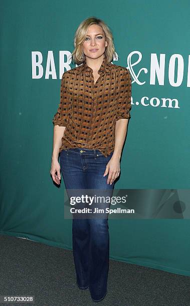 Actress Kate Hudson signs copies of "Pretty Happy: Healthy Ways to Love Your Body" at Barnes & Noble Union Square on February 16, 2016 in New York...