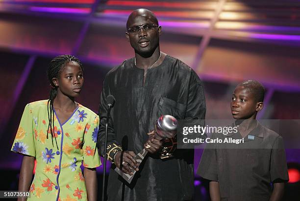 Soccer athlete George Weah and guests speak on stage at the 12th Annual ESPY Awards held at the Kodak Theatre on July 14, 2004 in Hollywood,...