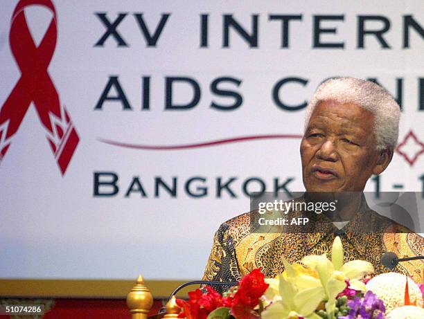 Former South African president Nelson Mandela delivers his speech during the closing ceremony of the 15th International AIDS Conference in Bangkok,...