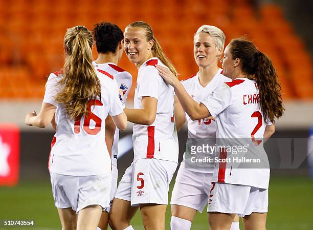 Rebecca Quinn of Canada celebrates with her teammates after scoring a second half goal against Guatemala during the 2016 CONCACAF Women's Olympic...