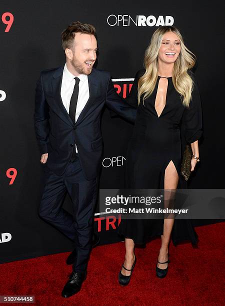 Actor Aaron Paul and director Lauren Parsekian attend the premiere of Open Road's "Triple 9" at Regal Cinemas L.A. Live on February 16, 2016 in Los...