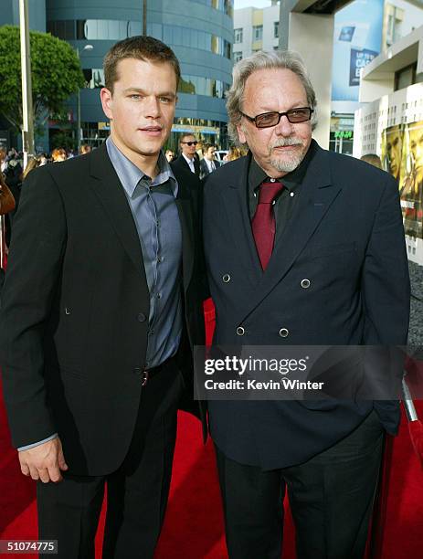Actor Matt Damon and Robert Rosen, Dean of the UCLA School of Theater, Film and Television, pose at the premiere of Universal's "The Bourne...