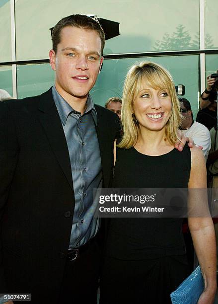 Actor Matt Damon and Universal's Stacey Snider pose at the premiere of Universal's "The Bourne Supremacy" at the Arclight Cinemas on July 15, 2004 in...