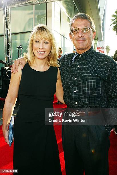 Universal's Stacey Snider and Ron Meyer pose at the premiere of Universal's "The Bourne Supremacy" at the Arclight Cinemas on July 15, 2004 in Los...