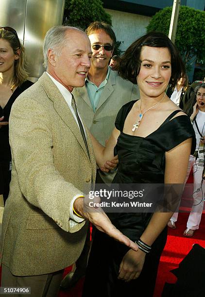 Producers Frank Marshall and Patrick Crowley and actress Franka Potente pose at the premiere of Universal's "The Bourne Supremacy" at the Arclight...