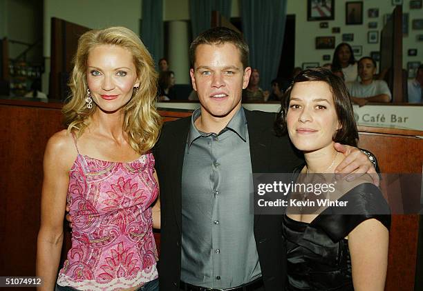 Actors Joan Allen , Matt Damon and Franka Potente pose at the premiere of Universal's "The Bourne Supremacy" at the Arclight Cinemas on July 15, 2004...