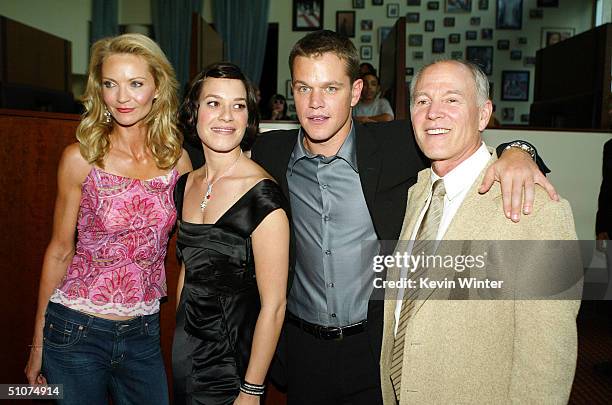Actors Joan Allen , Franka Potente, Matt Damon and producer Frank Marshall pose at the premiere of Universal's "The Bourne Supremacy" at the Arclight...