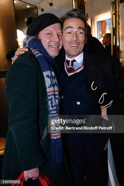 Singer Philip Catherine and Vincent Darre attend Arielle Dombasle presents her Perfume "Le secret d'Arielle" at Galerie Pierre Passebon on February...