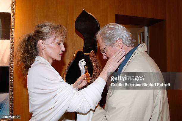 Arielle Dombasle and Baron Eric de Rothschild attend Arielle Dombasle presents her Perfume "Le secret d'Arielle" at Galerie Pierre Passebon on...