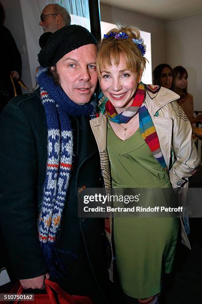 Singer Philip Catherine and Director Julie Depardieu attend Arielle Dombasle presents her Perfume "Le secret d'Arielle" at Galerie Pierre Passebon on...