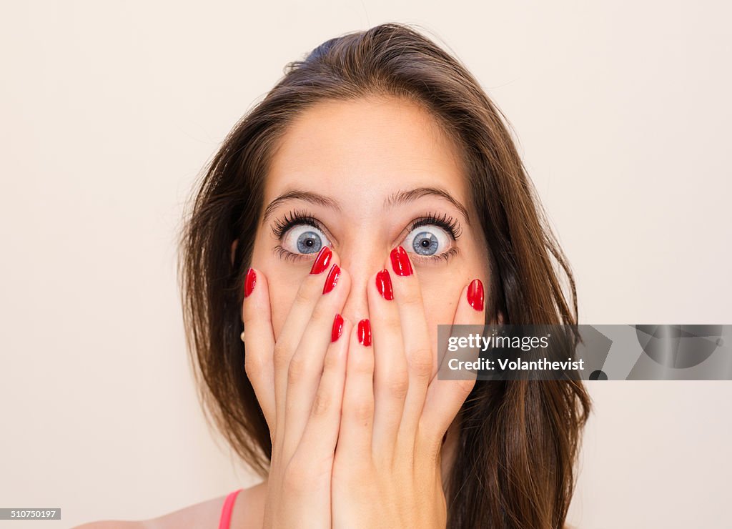 Surprised woman with eyes wide open