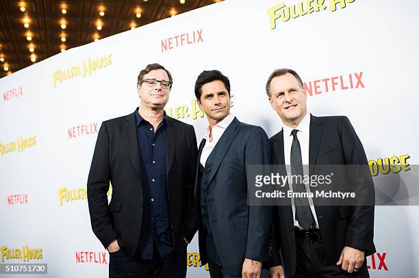 Actors Bob Saget, John Stamos, and Dave Coulier attend the premiere of Netflix's 'Fuller House' at Pacific Theatres at The Grove on February 16, 2016...