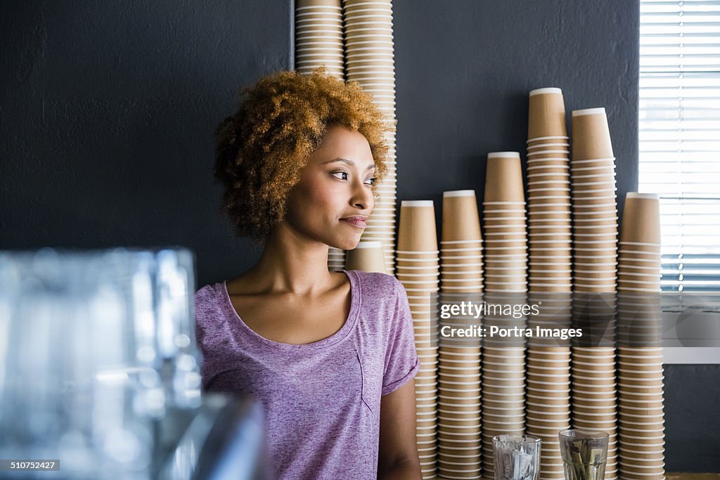 Thoughtful business owner in cafe