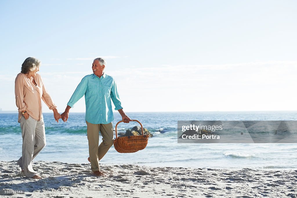 Senior couple enjoying on beach