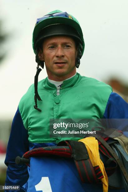 Jockey Richard Quinn looks on at Newbury Racecourse on July 16, 2004 in Newbury, England.