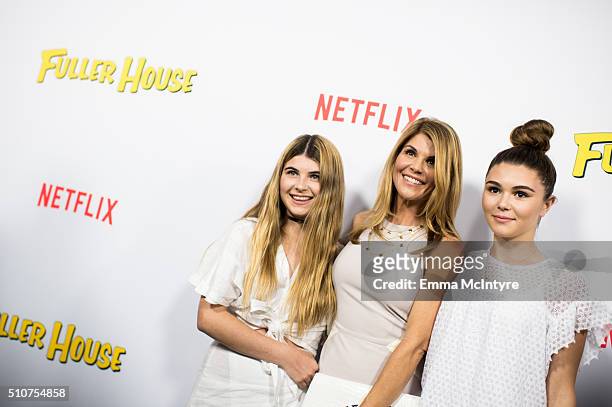Actress Lori Loughlin and daughters Isabella Giannulli and Olivia Giannulli attend the premiere of Netflix's 'Fuller House' at Pacific Theatres at...
