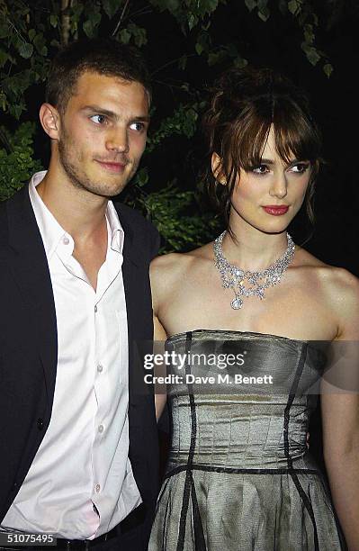 Actress Keira Knightley with her boyfriend Jamie Dornan attend the after party following the European Premiere of "King Arthur" at the Guildhall on...