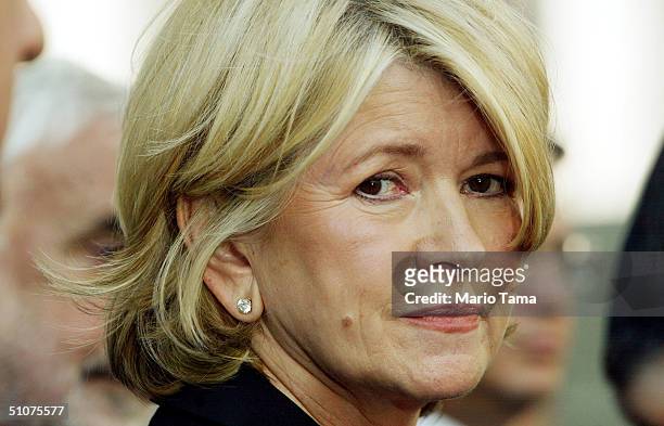 Martha Stewart stands outside Federal Court after her sentencing hearing July 16, 2004 in New York City. Stewart was sentenced to five months in...