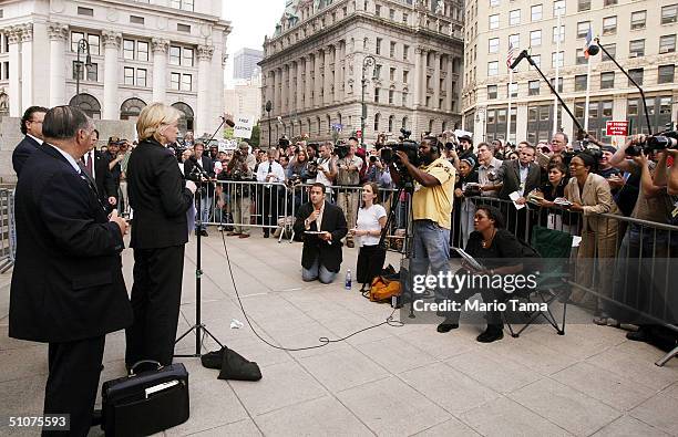 Martha Stewart speaks to the media outside Federal Court after her sentencing hearing July 16, 2004 in New York City. Stewart was sentenced to five...