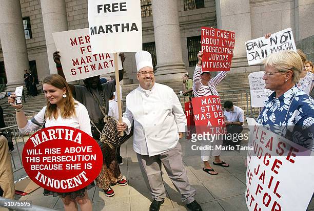 Martha Stewart supporters stand outside Federal Court during her sentencing hearing July 16, 2004 in New York City. Stewart was sentenced to five...