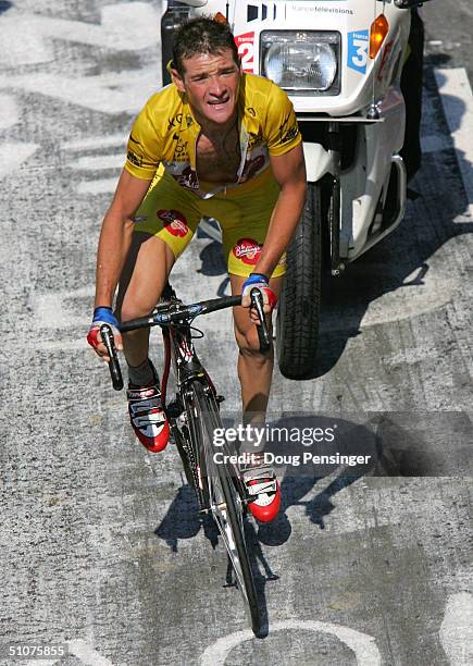 Thomas Voeckler of France and riding for Brioches la Boulangere conserved the yellow jersey as he makes his way on his own during the final two...