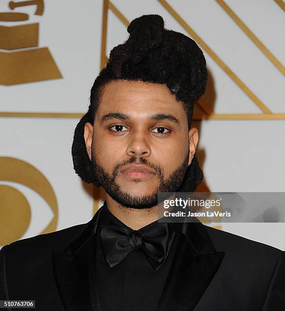 The Weeknd poses in the press room at the The 58th GRAMMY Awards at Staples Center on February 15, 2016 in Los Angeles, California.