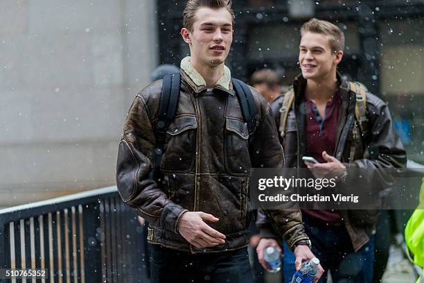 Male models wearing brown leather jackets seen outside Jeremy Scott during New York Fashion Week: Women's Fall/Winter 2016 on February 15, 2016 in...
