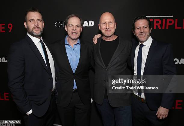 Producer Keith Redmon, Open Road CEO Tom Ortenberg, Director John Hillcoat and Producer Bard Dorros attend the premiere Of Open Road's "Triple 9" at...