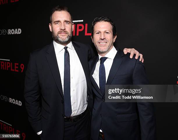 Producer Keith Redmon and Producer Bard Dorros attend the premiere Of Open Road's "Triple 9" at Regal Cinemas L.A. Live on February 16, 2016 in Los...
