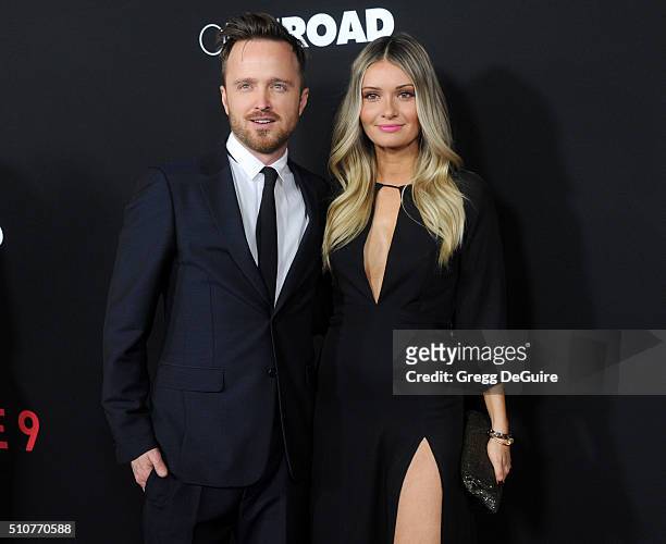 Actor Aaron Paul and wife Lauren Parsekian arrive at the premiere of Open Road's "Triple 9" at Regal Cinemas L.A. Live on February 16, 2016 in Los...