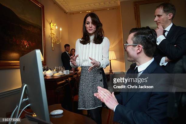 Catherine, Duchess of Cambridge talks to James Martin and Steven Hull on the Huffington Post landing page in the 'News Room' at Kensington Palace on...