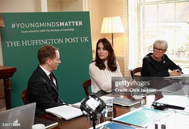 Catherine, Duchess of Cambridge talks to Steven Hull in the 'News Room' at Kensington Palace on February 17, 2016 in London, England. The Duchess of...