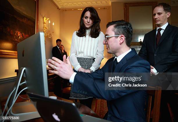 Catherine, Duchess of Cambridge talks to James Martin and Steven Hull on the Huffington Post landing page in the 'News Room' at Kensington Palace on...