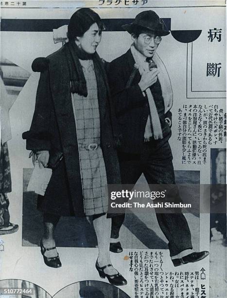 Couple called 'Mobo and Moga' walk on a street circa April 1929 in Tokyo, Japan.