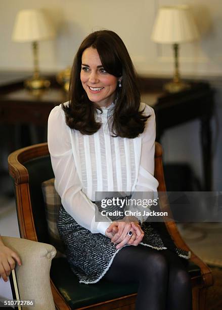 Catherine, Duchess of Cambridge talks to children from the 'Real Truth' video blog that features on the Huffington Post website at Kensington Palace...