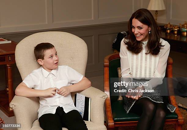 Catherine, Duchess of Cambridge chats to Hayden Pearce from the 'Real Truth' video blog that features on the Huffington Post website at Kensington...