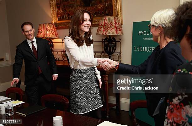Catherine, Duchess of Cambridge meets staff in the 'News Room' at Kensington Palace on February 17, 2016 in London, England. The Duchess of Cambridge...