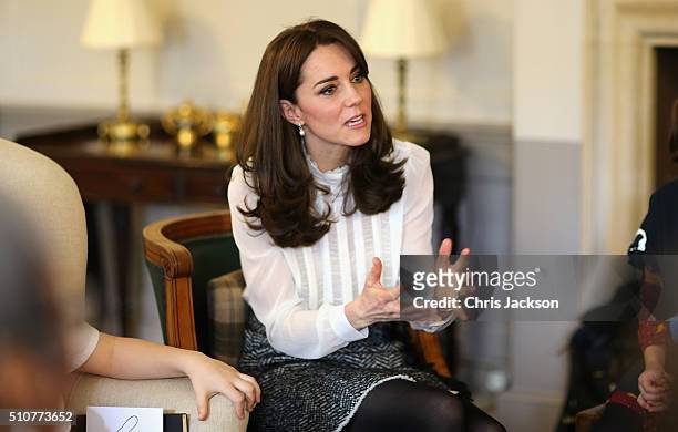 Catherine, Duchess of Cambridge talks to children from the 'Real Truth' video blog that features on the Huffington Post website at Kensington Palace...