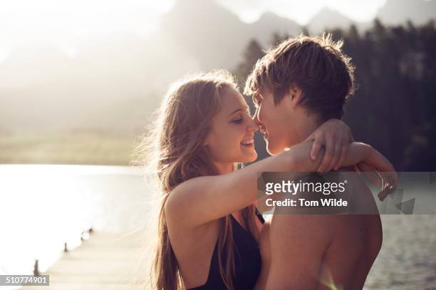 young couple about to kiss in a natural environmen - svaghet bildbanksfoton och bilder
