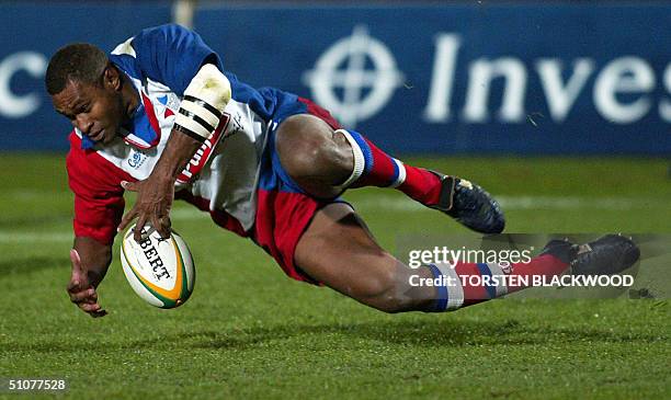 Islander Rugby 62 Rugby Player On Wet Field Stock Photos, High-Res Pictures, and ...