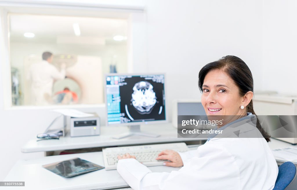 Doctor reading a CAT scan