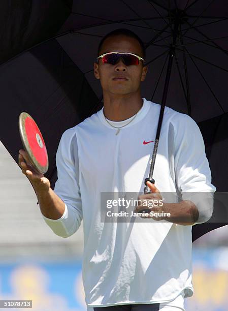 Bryan Clay competes in the Decathlon Discus Throw during the U.S. Olympic Team Track & Field Trials on July 17, 2004 at the Alex G. Spanos Sports...